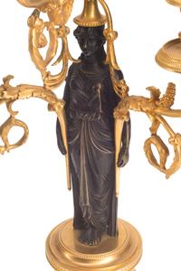 An Empire Gilt and Patinated Bronze Clock Garniture