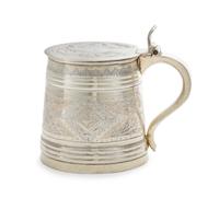 A Russian Silver Child's Tankard, Maker's Mark Cyrillic H.A, Moscow, 1869, the lid and body chased with floral and foliate volute bandi