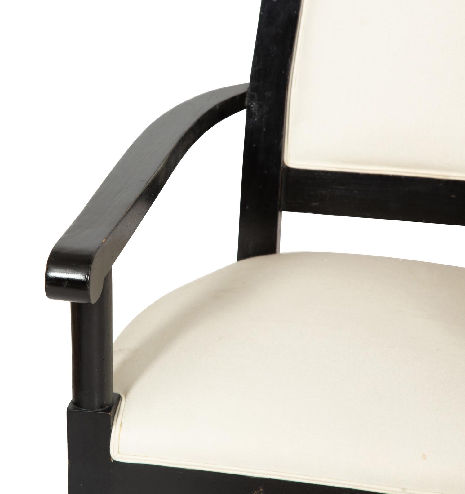 A Pair of Continental Ebonized Armchairs