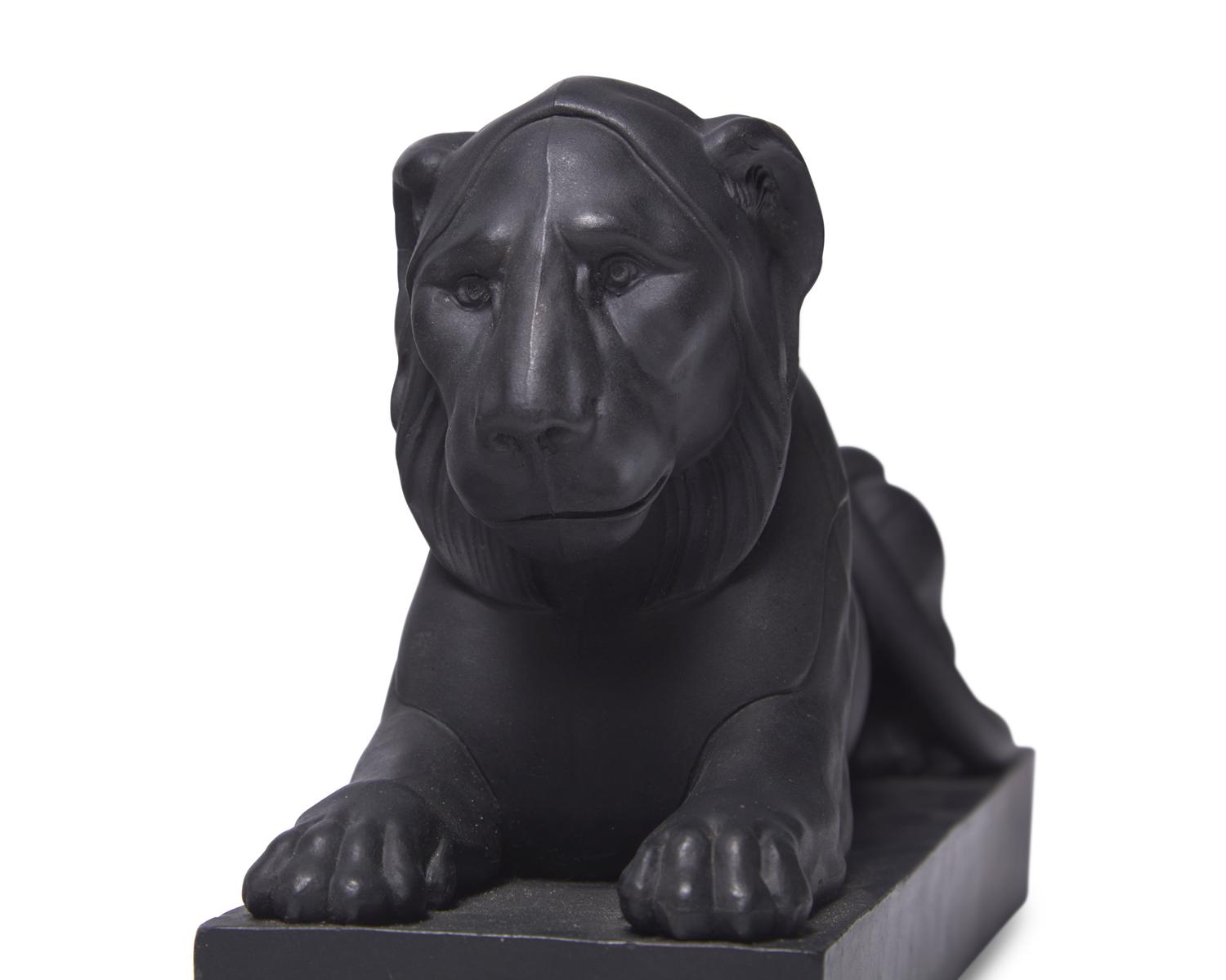 A Wedgwood Black Basalt Figure of a Lion Couchant