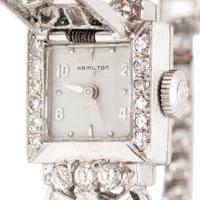 HAMILTON, PLATINUM AND DIAMOND HIDDEN DIAL WATCH