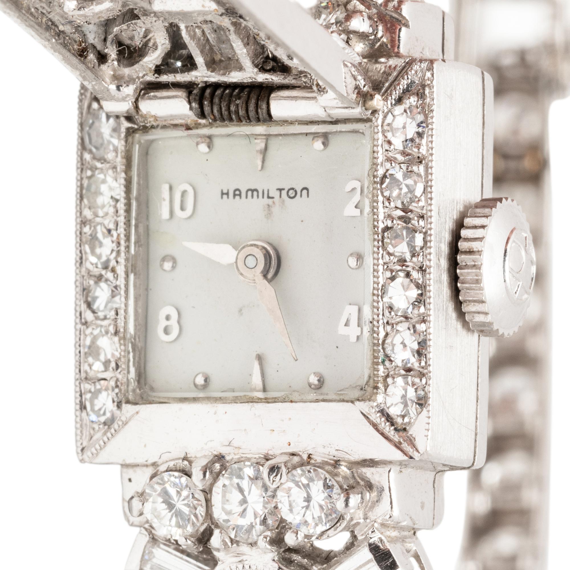 HAMILTON, PLATINUM AND DIAMOND HIDDEN DIAL WATCH