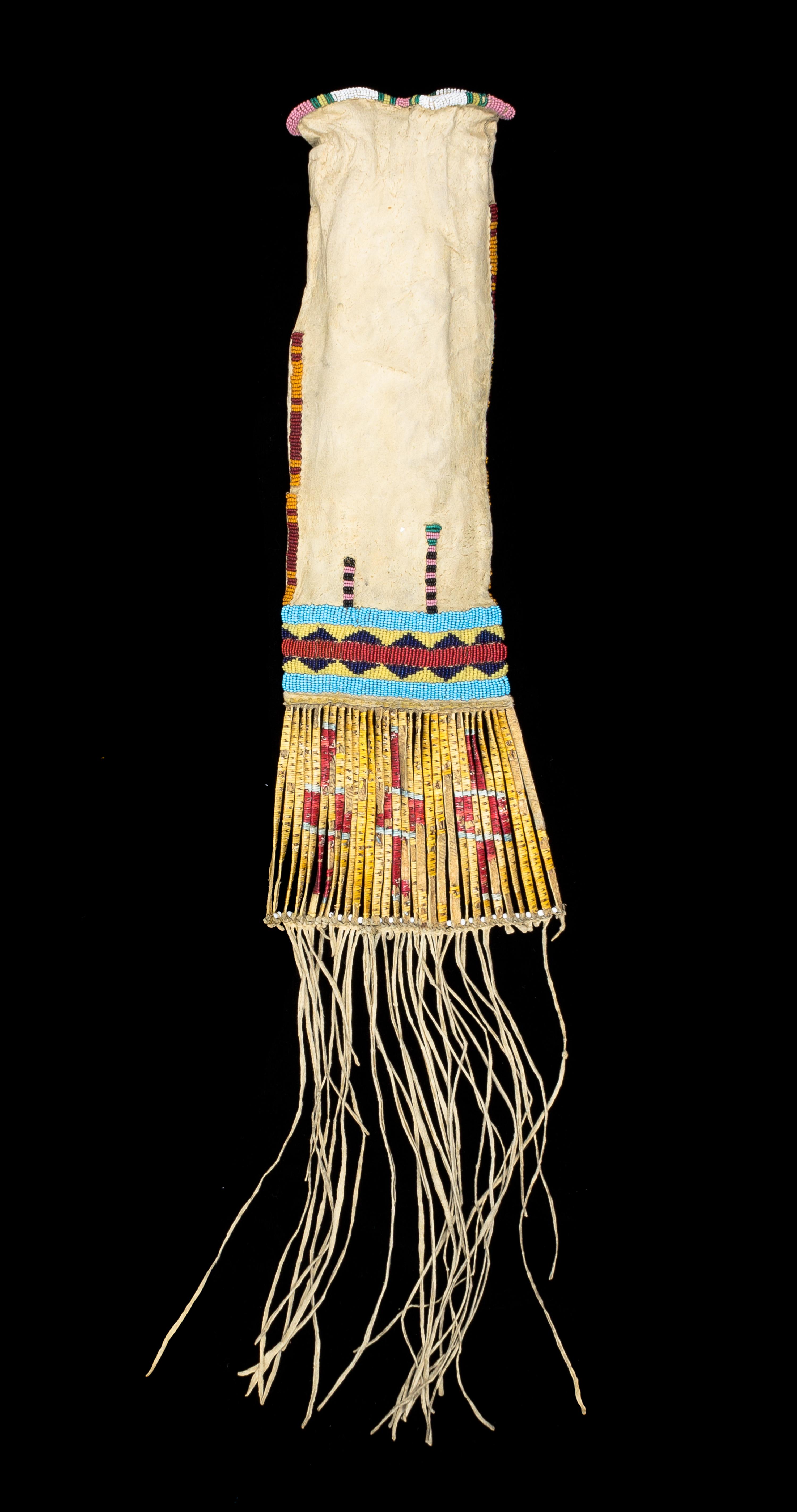 A Cheyenne Beaded and Quill Pipe Bag Length overall 26 x width 4 1/2 inches.
