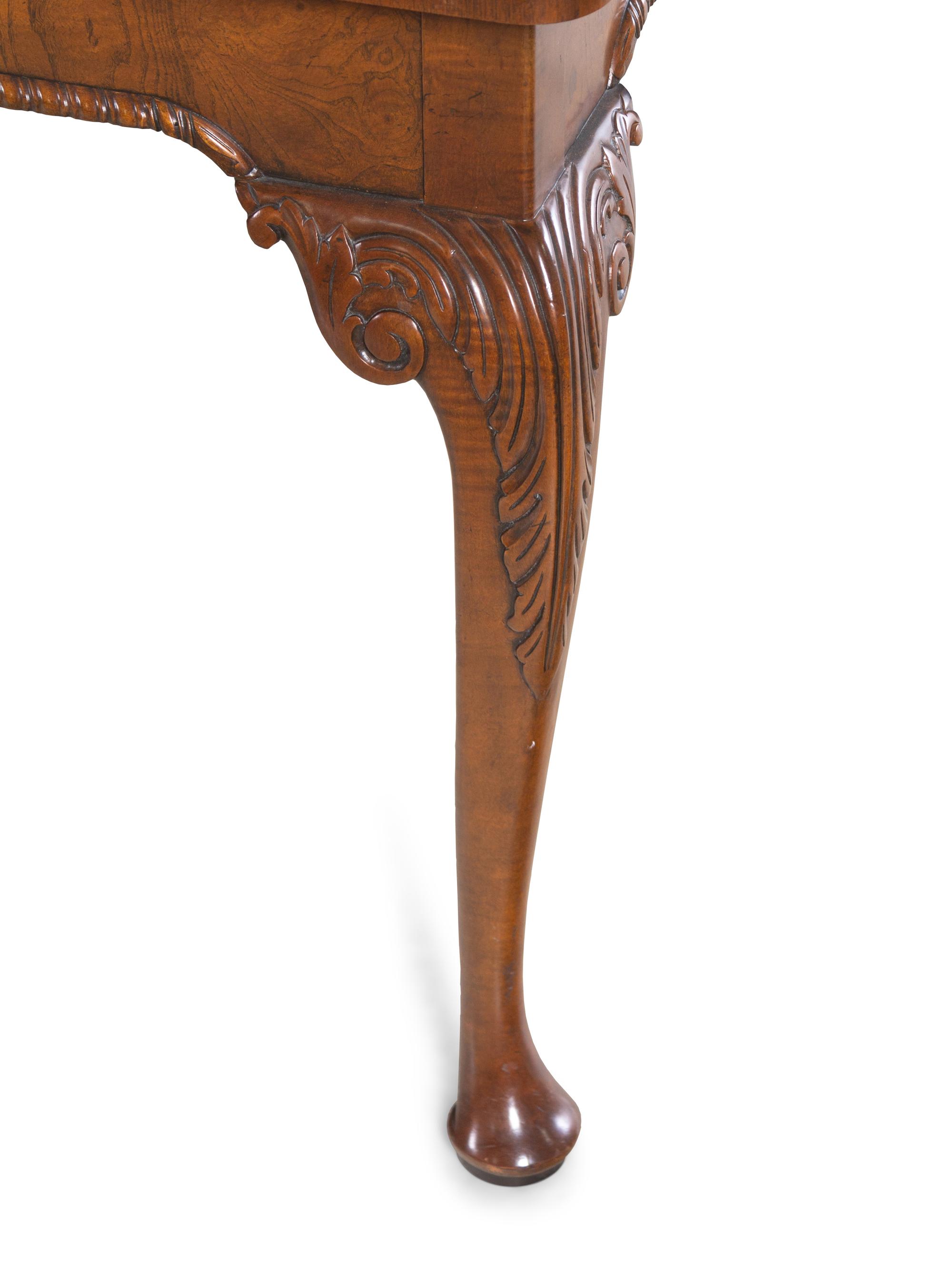 A Baker George II Style Walnut Dining Table