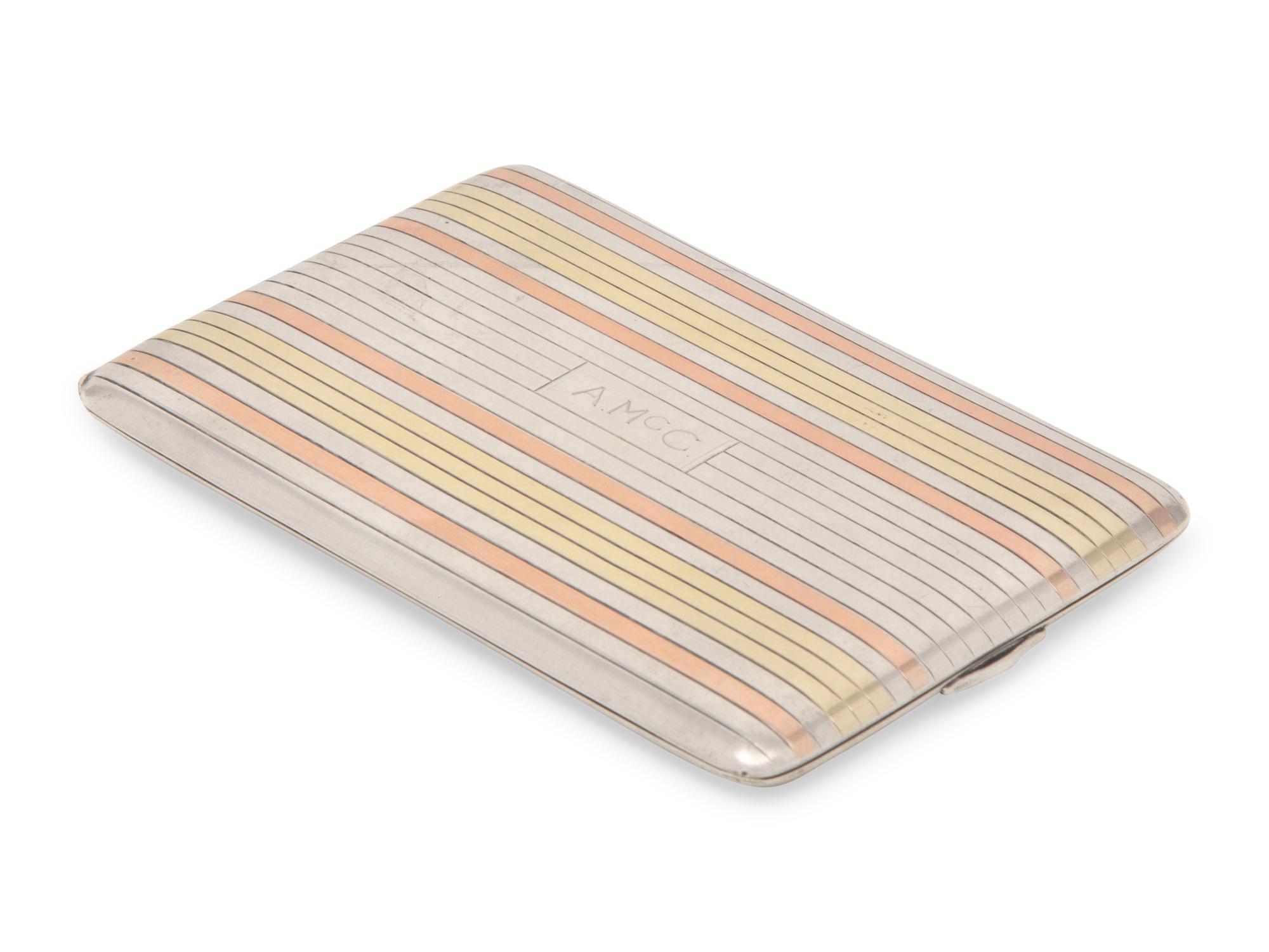 An American Silver and 14-Karat Gold Cigarette Case