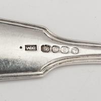 A Collection of English Silver Basting and Serving Spoons