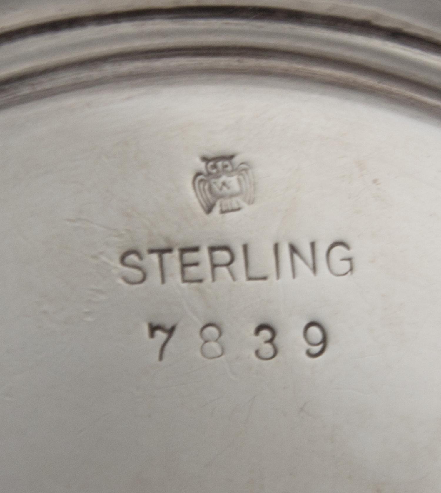 An American Silver Platter, Weidlich Serling Spoon Co., Bridgeport, CT, of oval form.