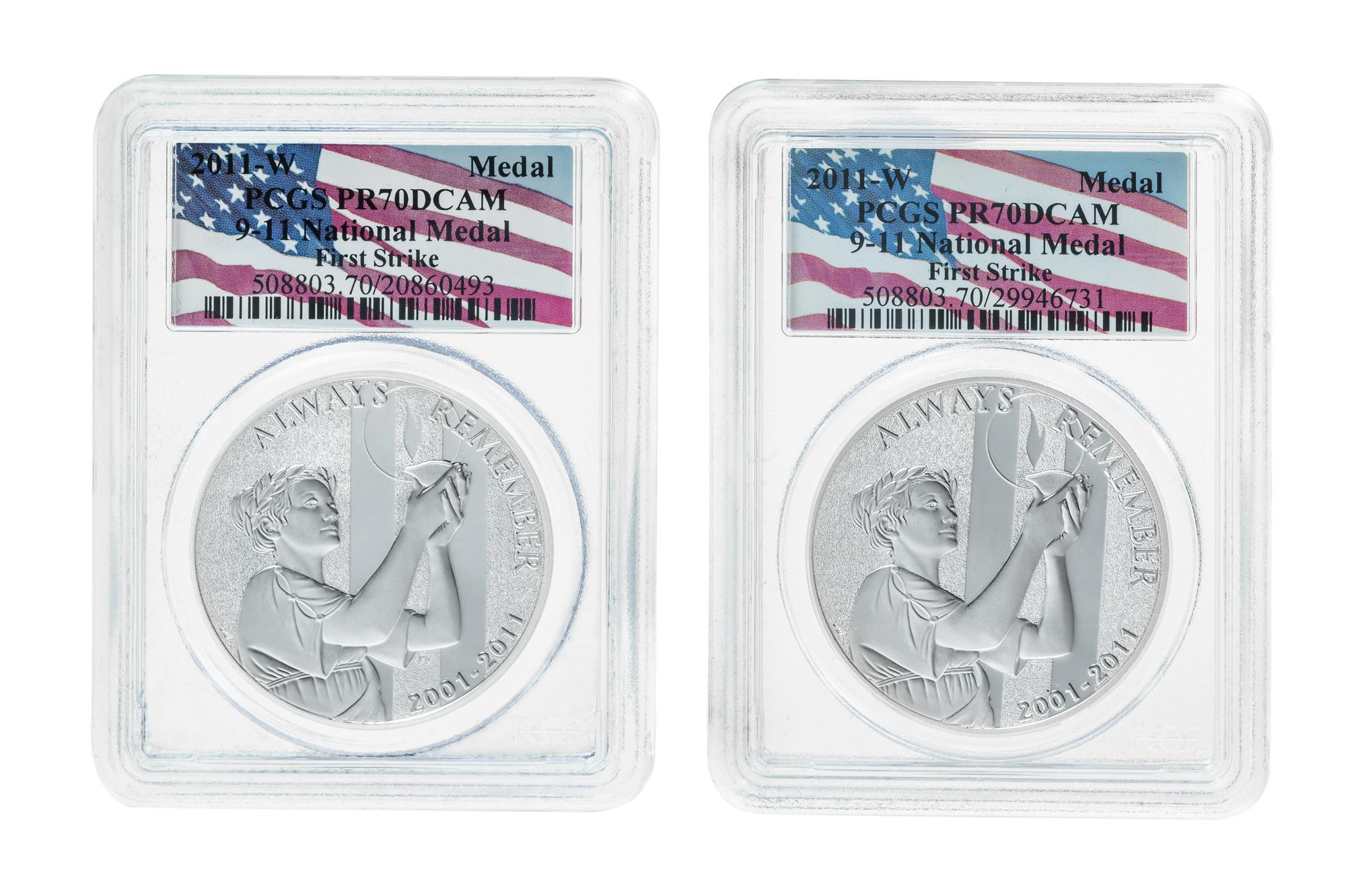 A Pair of United States 2011-W September 11, 2001 Memorial Limited Edition First Strike 1 Oz. Silver Medals
