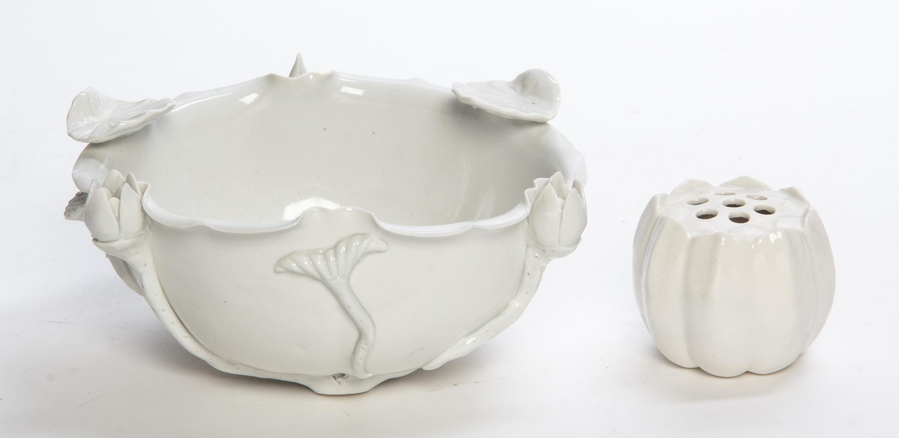 A White Glazed Porcelain Basin Width 8 3/4 inches.