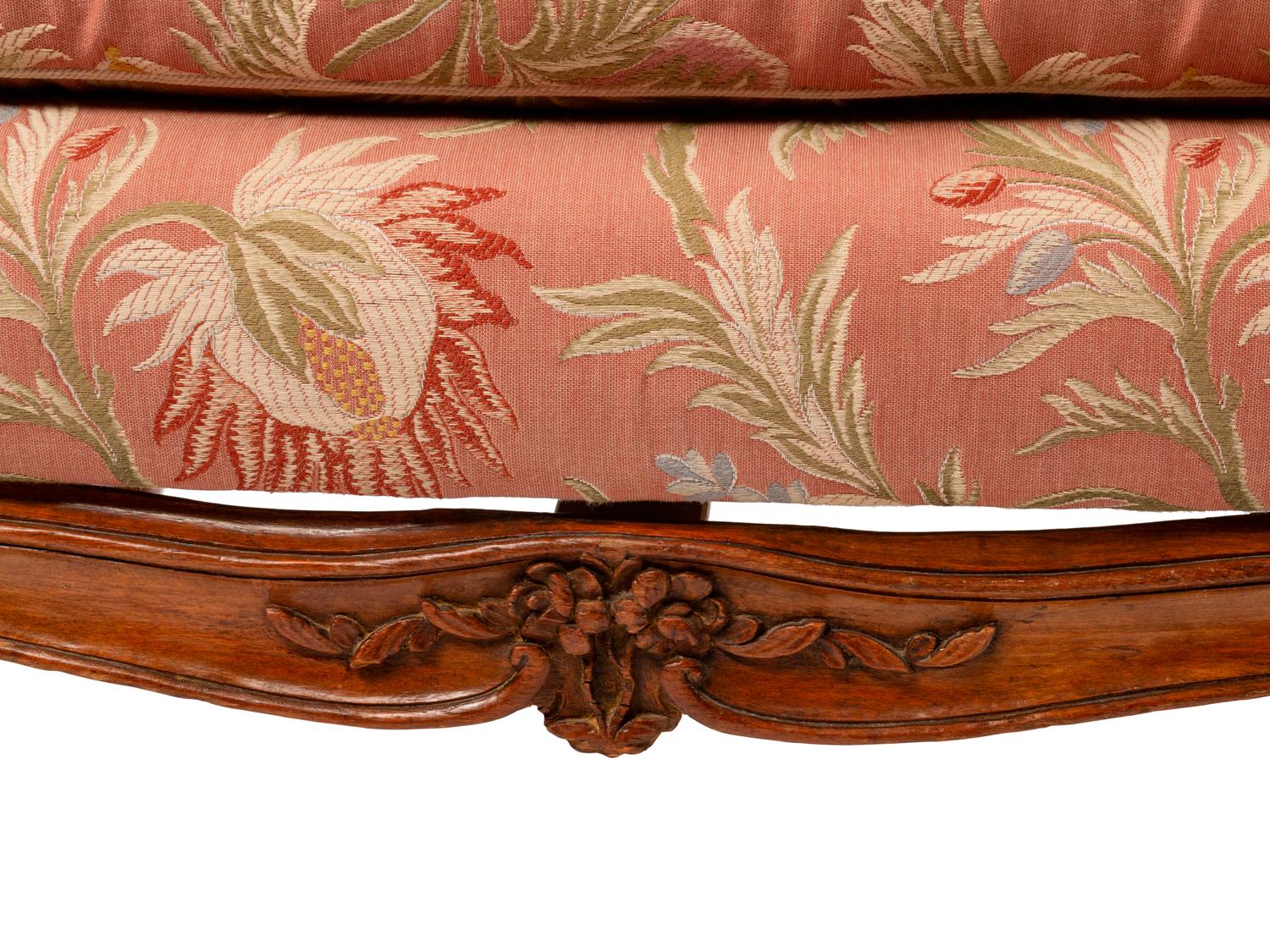 A Louis XV Provincial Carved Walnut Canapé — 19TH CENTURY