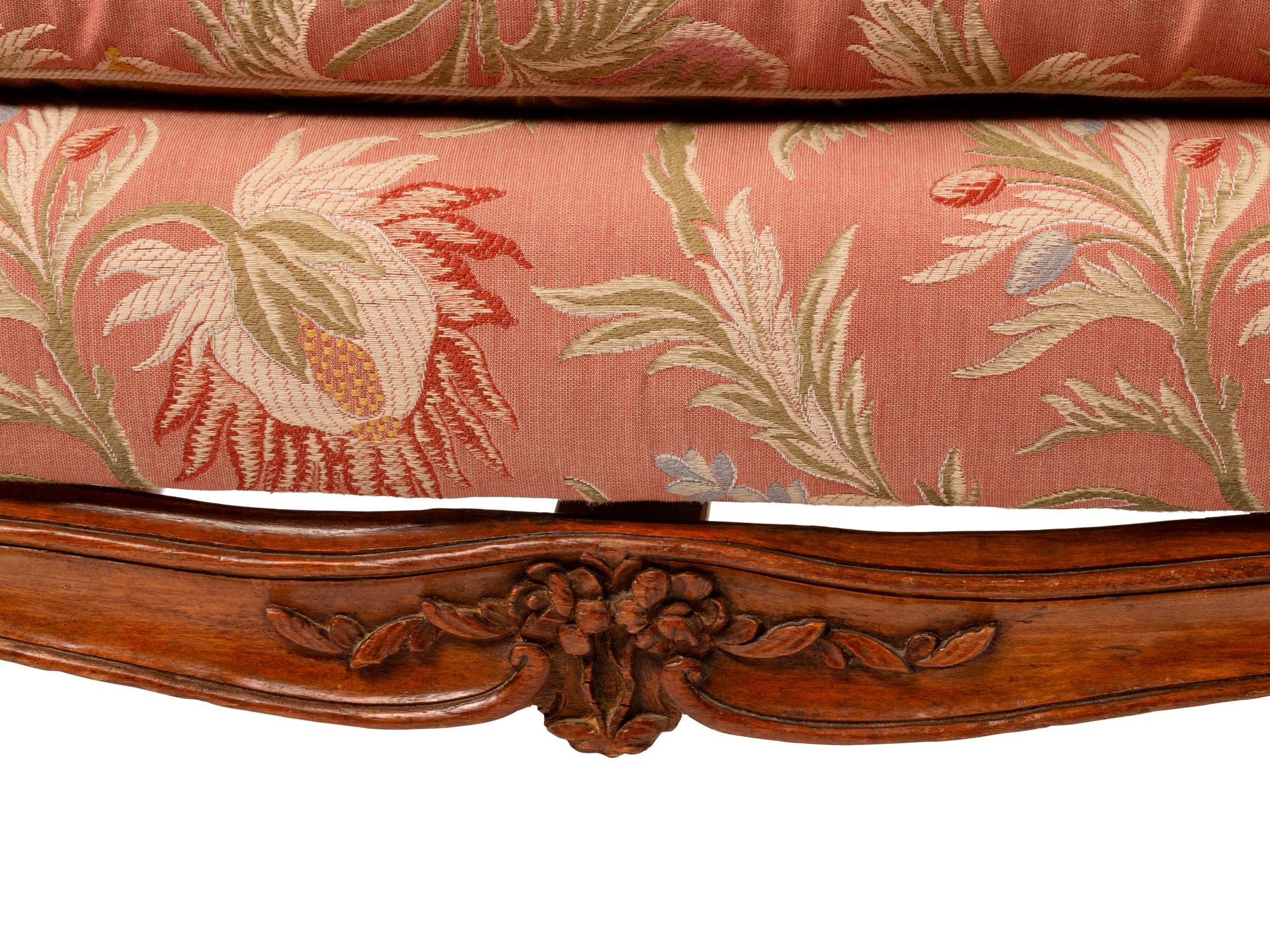 A Louis XV Provincial Carved Walnut Canapé — 19TH CENTURY