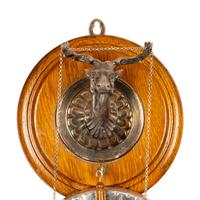 A Silver-Plate and Oak Dinner Gong