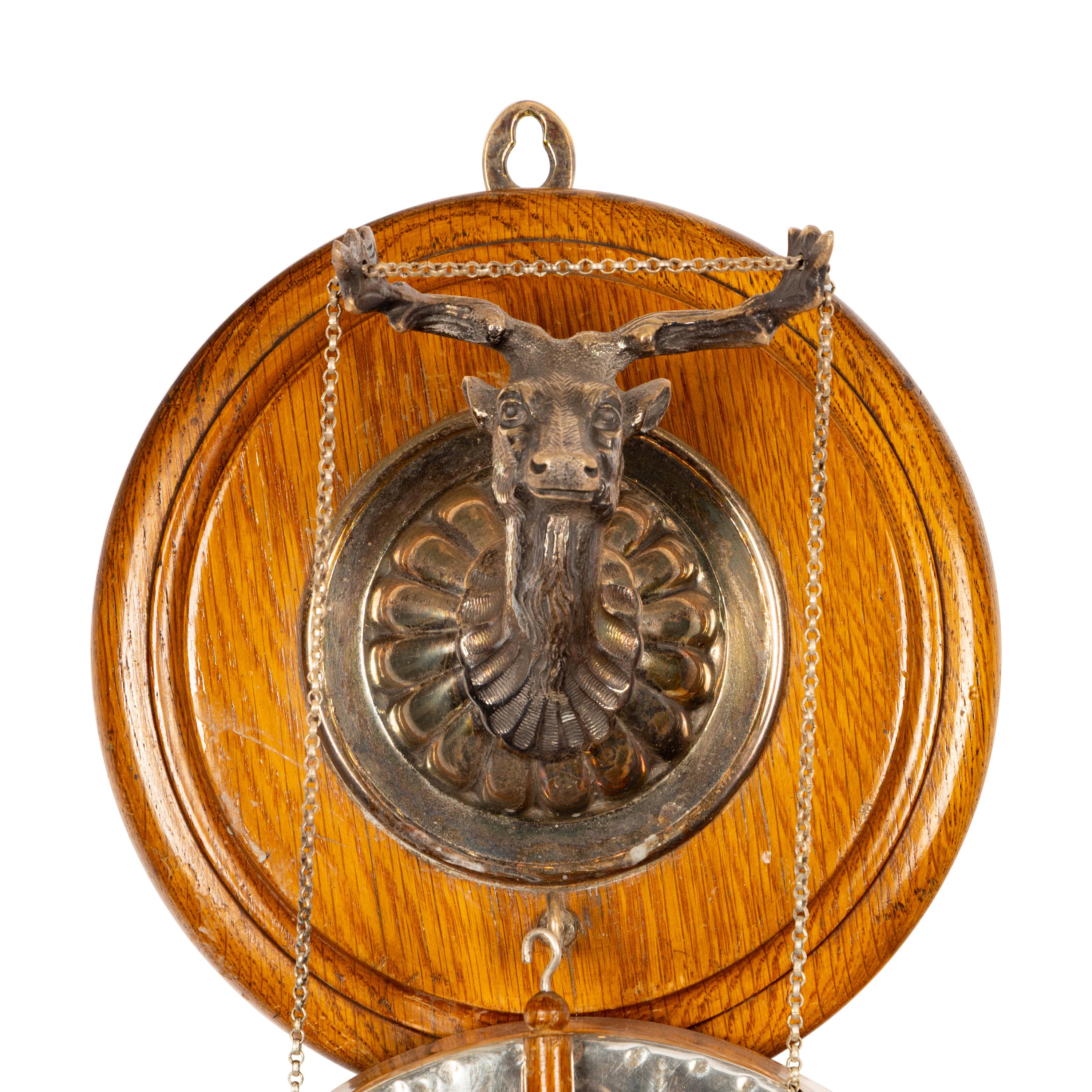 A Silver-Plate and Oak Dinner Gong
