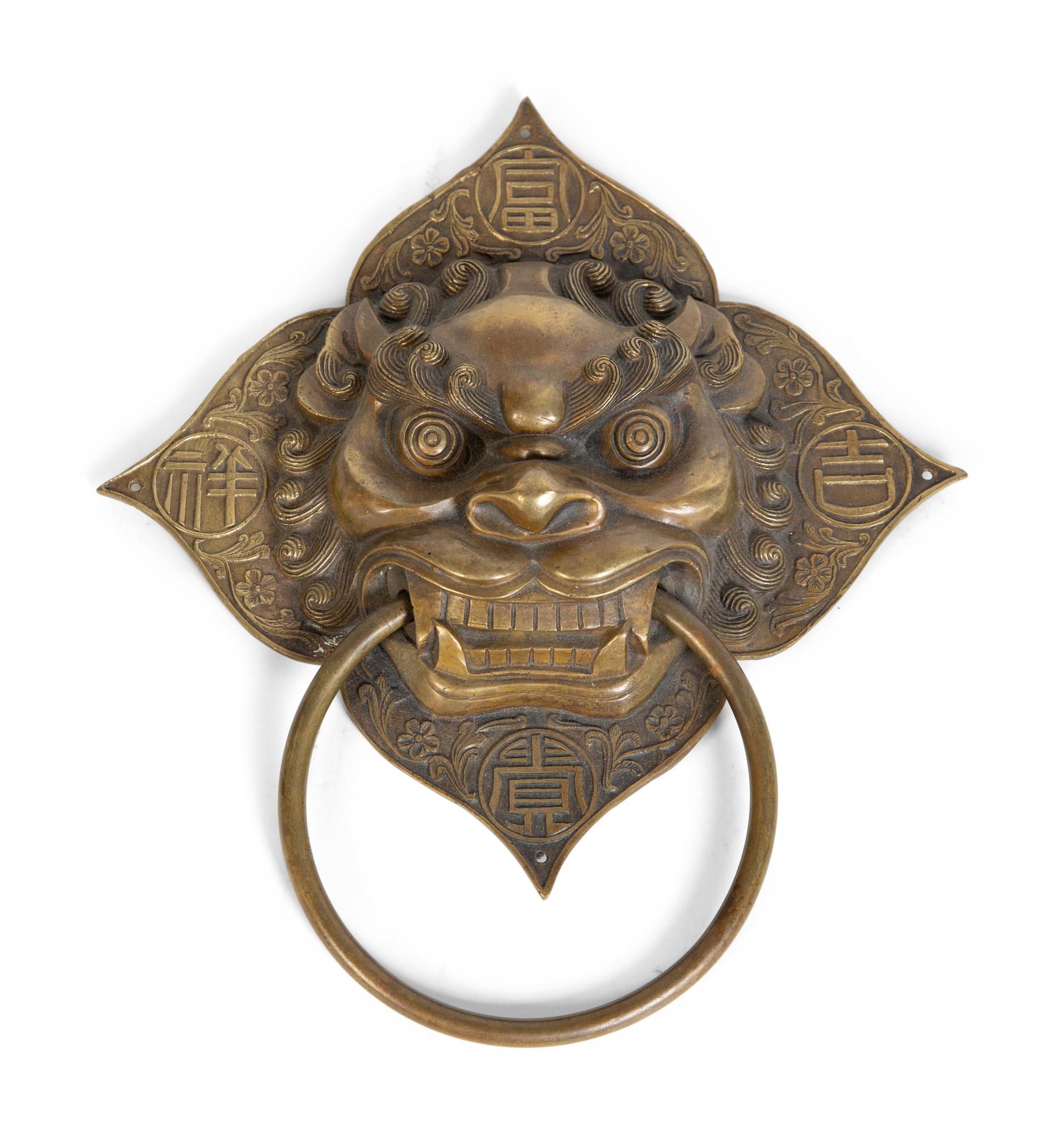 A Chinese Brass Foo Lion Mask Door Knocker — 20TH CENTURY