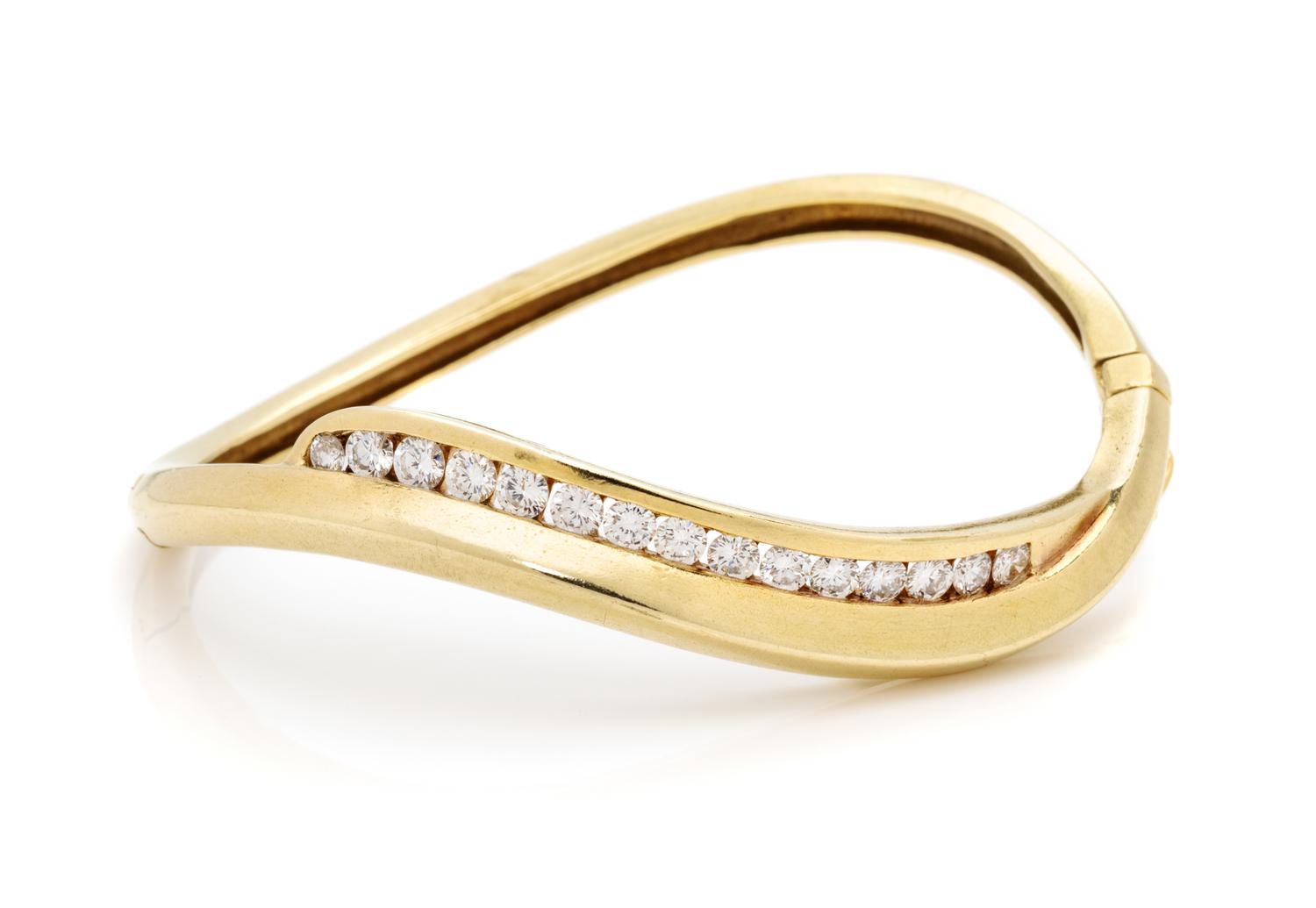 An 18 Karat Yellow Gold and Diamond Bangle Bracelet,