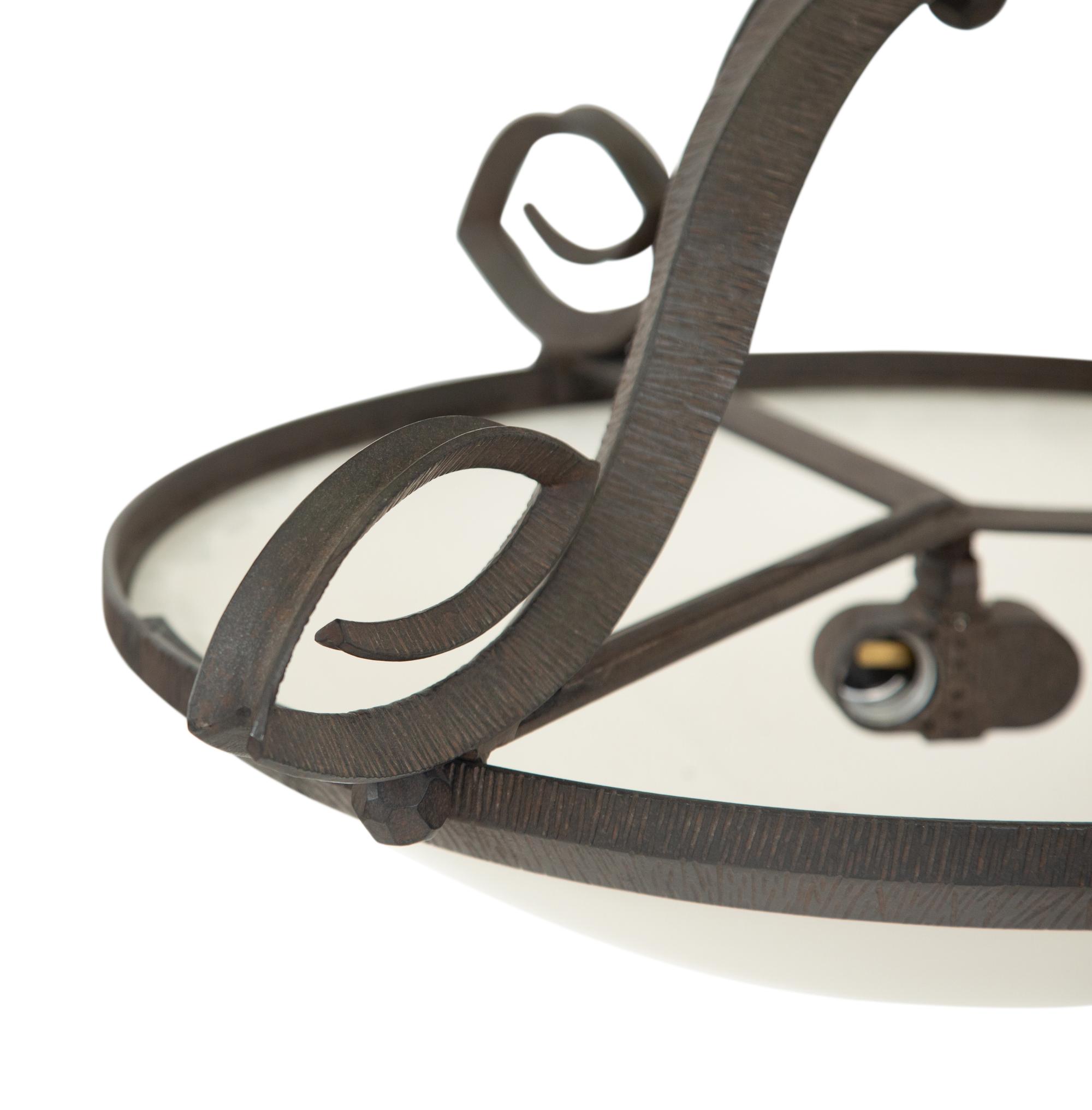 A Pair of Paul Ferrante Argyle Iron and Alabaster Pendant Lights