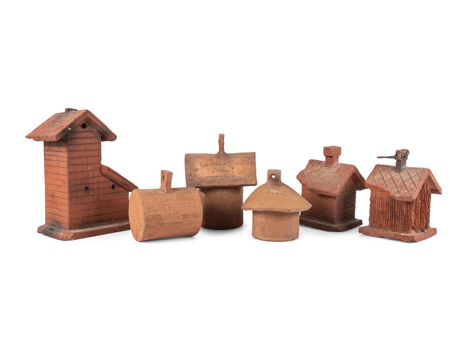 Seven Sewer Tile Birdhouses, Probably White Hall Pottery