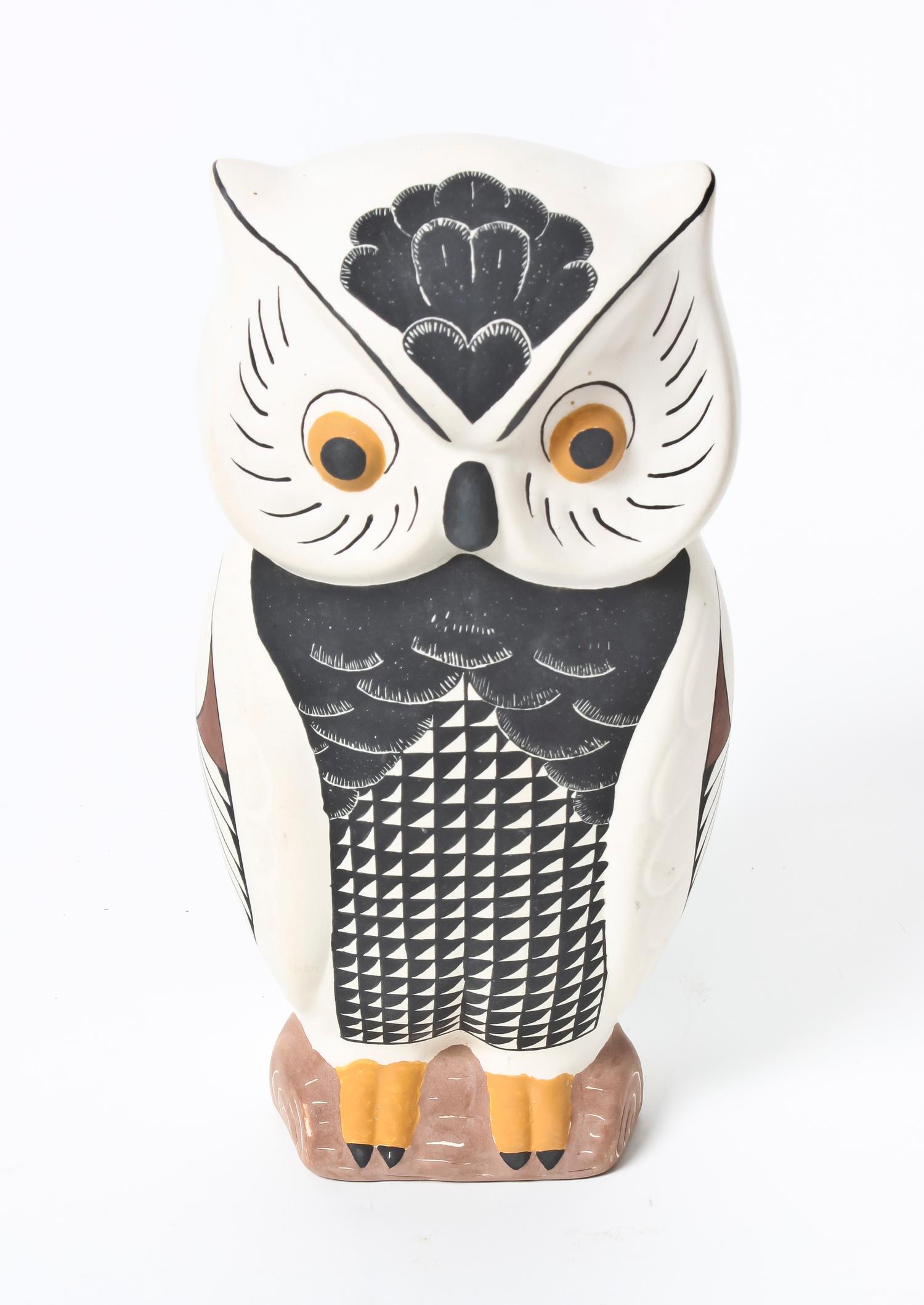 An Acoma Polychrome Owl Height 8 x diameter 4 inches.