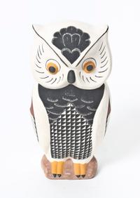 An Acoma Polychrome Owl Height 8 x diameter 4 inches.