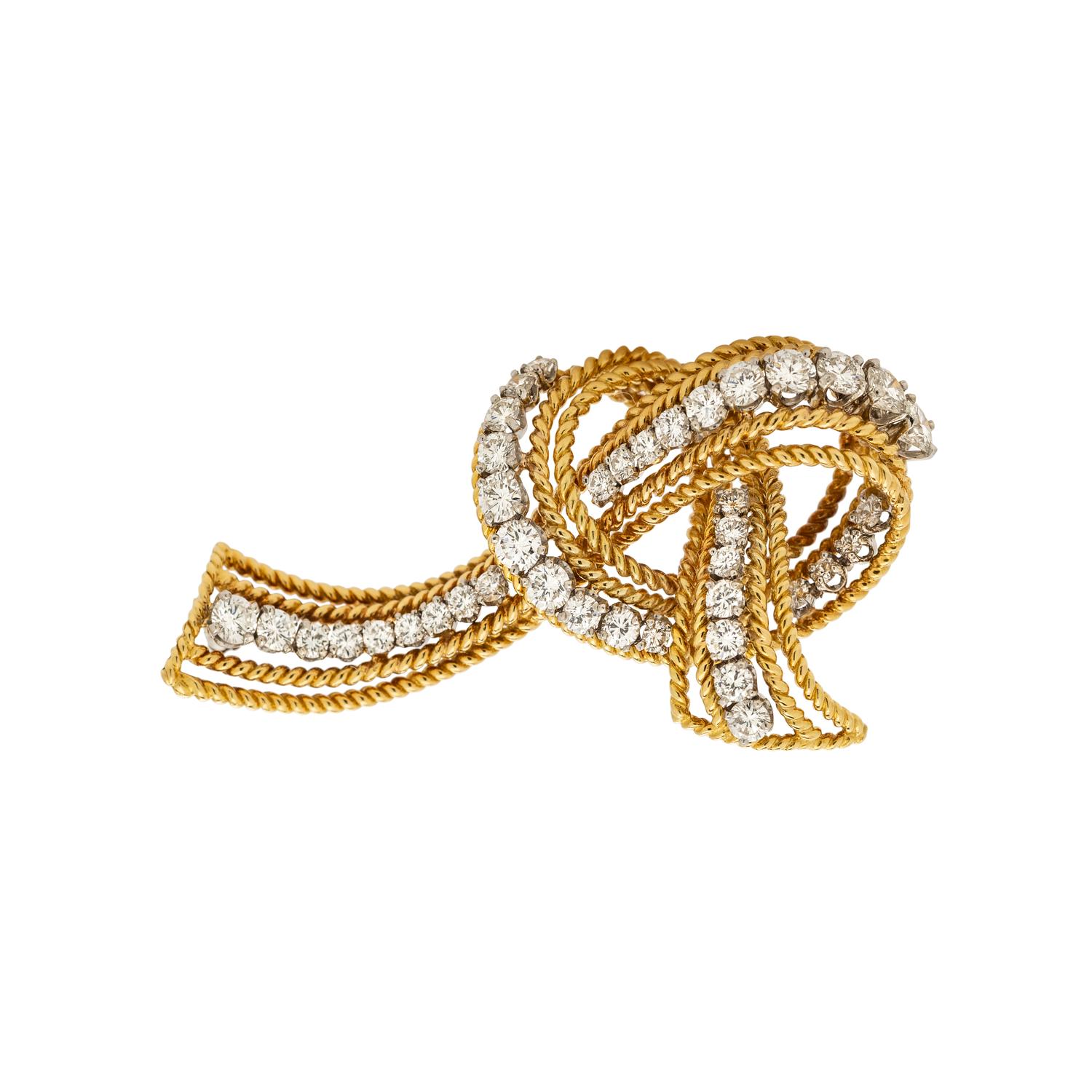 McTEIGUE & CO., YELLOW GOLD, PLATINUM AND DIAMOND RIBBON BROOCH