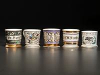 Five Porcelain Shaving Mugs with Floral and Foliate Decoration
