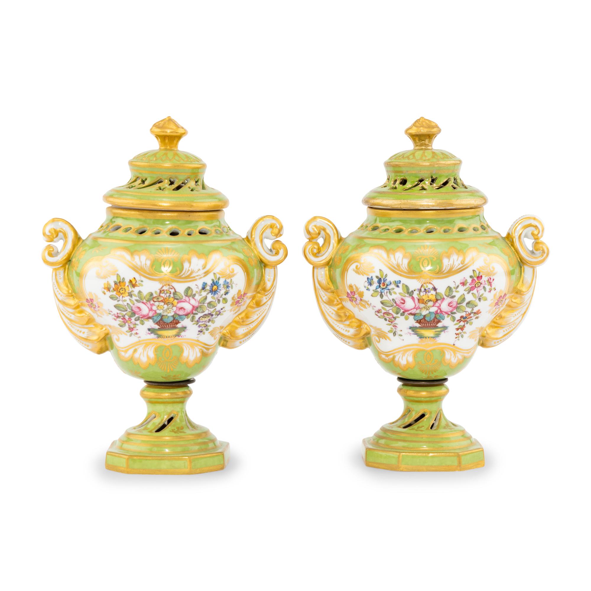 A Pair of Rockingham Porcelain Potpourri Urns