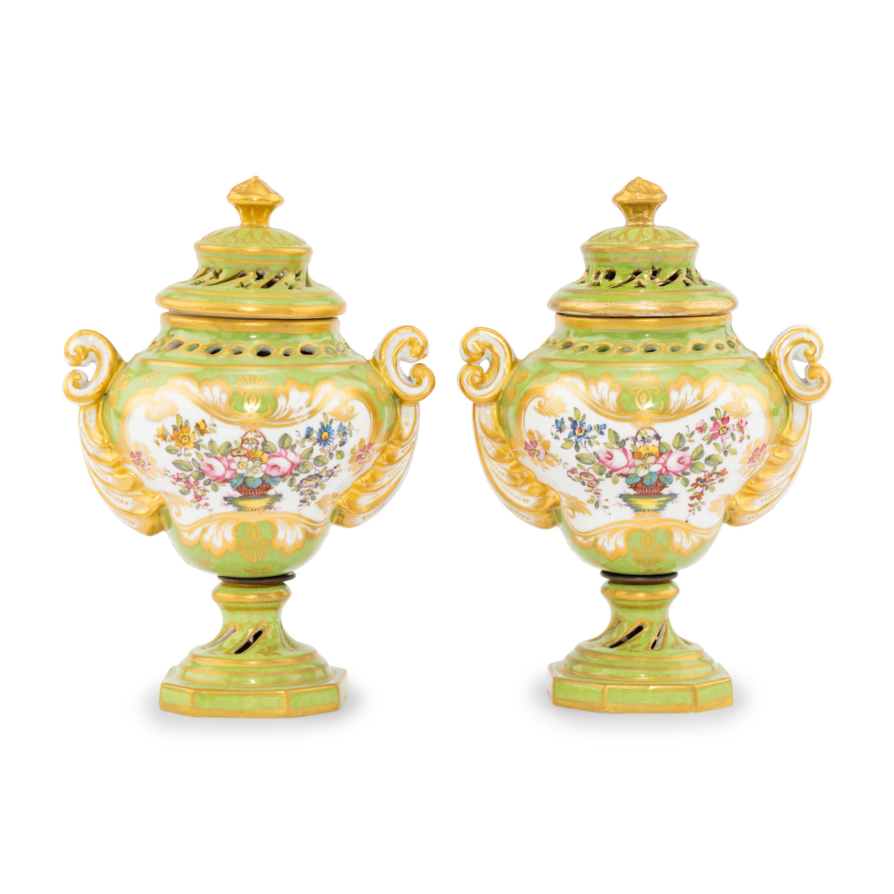 A Pair of Rockingham Porcelain Potpourri Urns