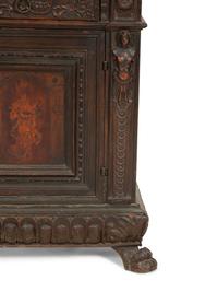 An Italian Carved Walnut Side Cabinet with Marquetry Panel Door