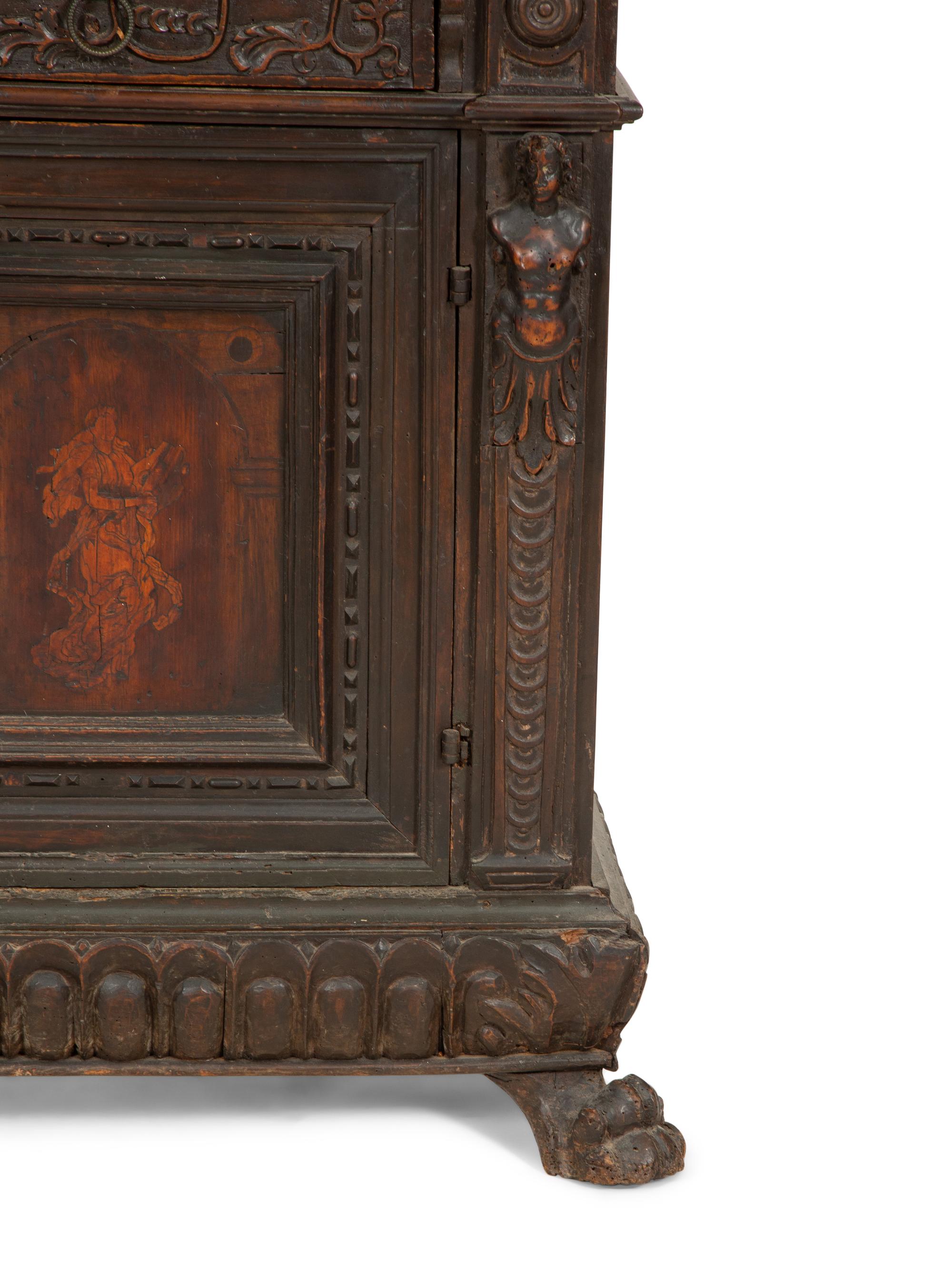 An Italian Carved Walnut Side Cabinet with Marquetry Panel Door