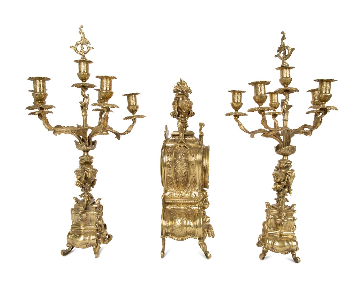 A Louis XV Style Gilt Metal Clock Garniture — LATE 19TH/EARLY 20TH CENTURY