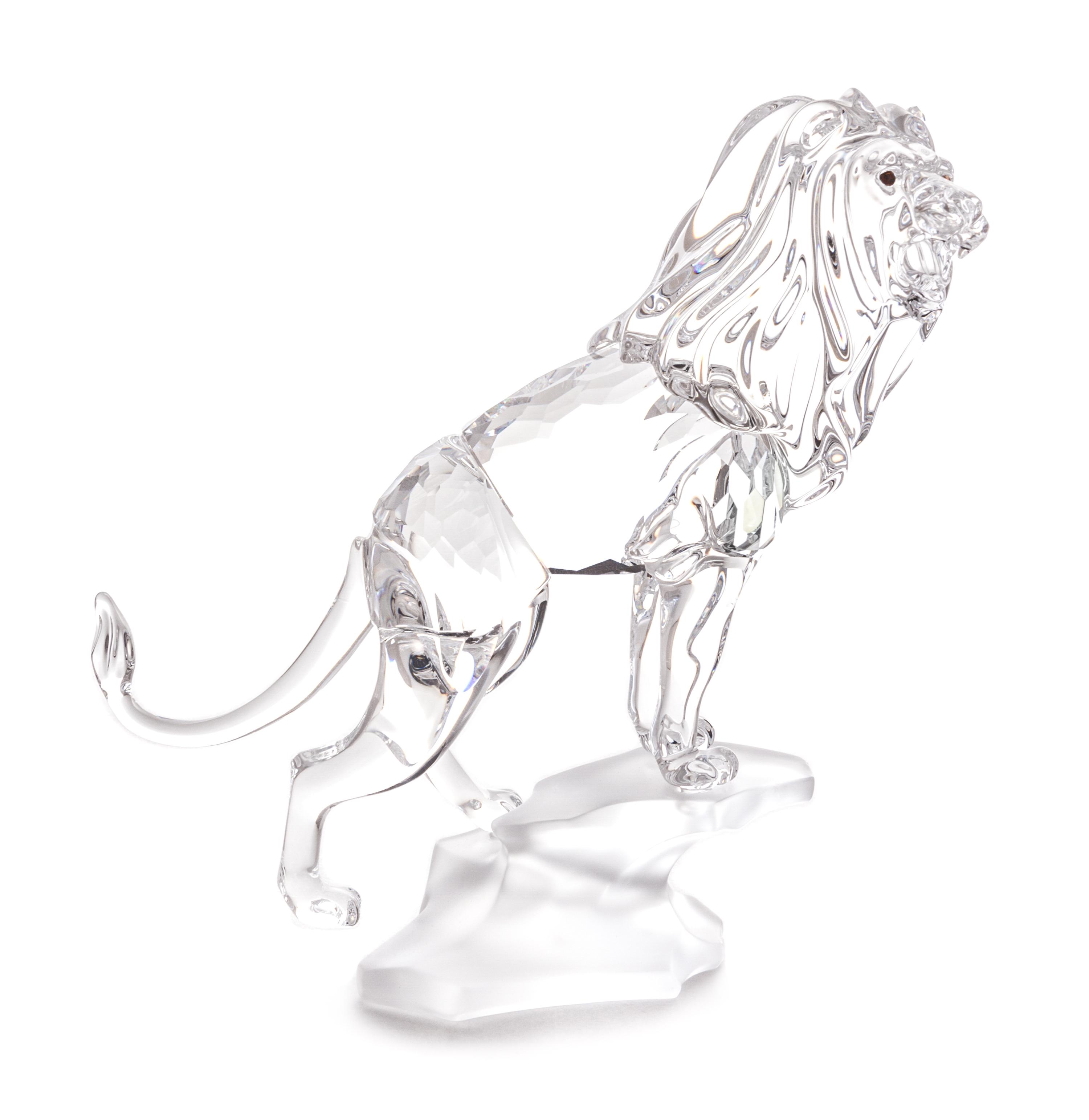 A Swarovski Model of a Lion Height 4 3/4 inches.