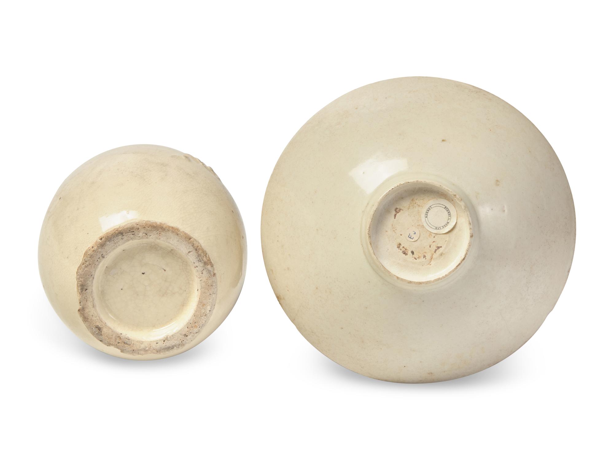 A Chinese, possibly Fujian, Cream Glazed Ewer and a White Glazed Bowl