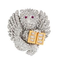 An 18 Karat Bicolor Gold, Diamond and Ruby St. Mark Winged Lion Brooch, Missiaglia, 18.25 dwts.
