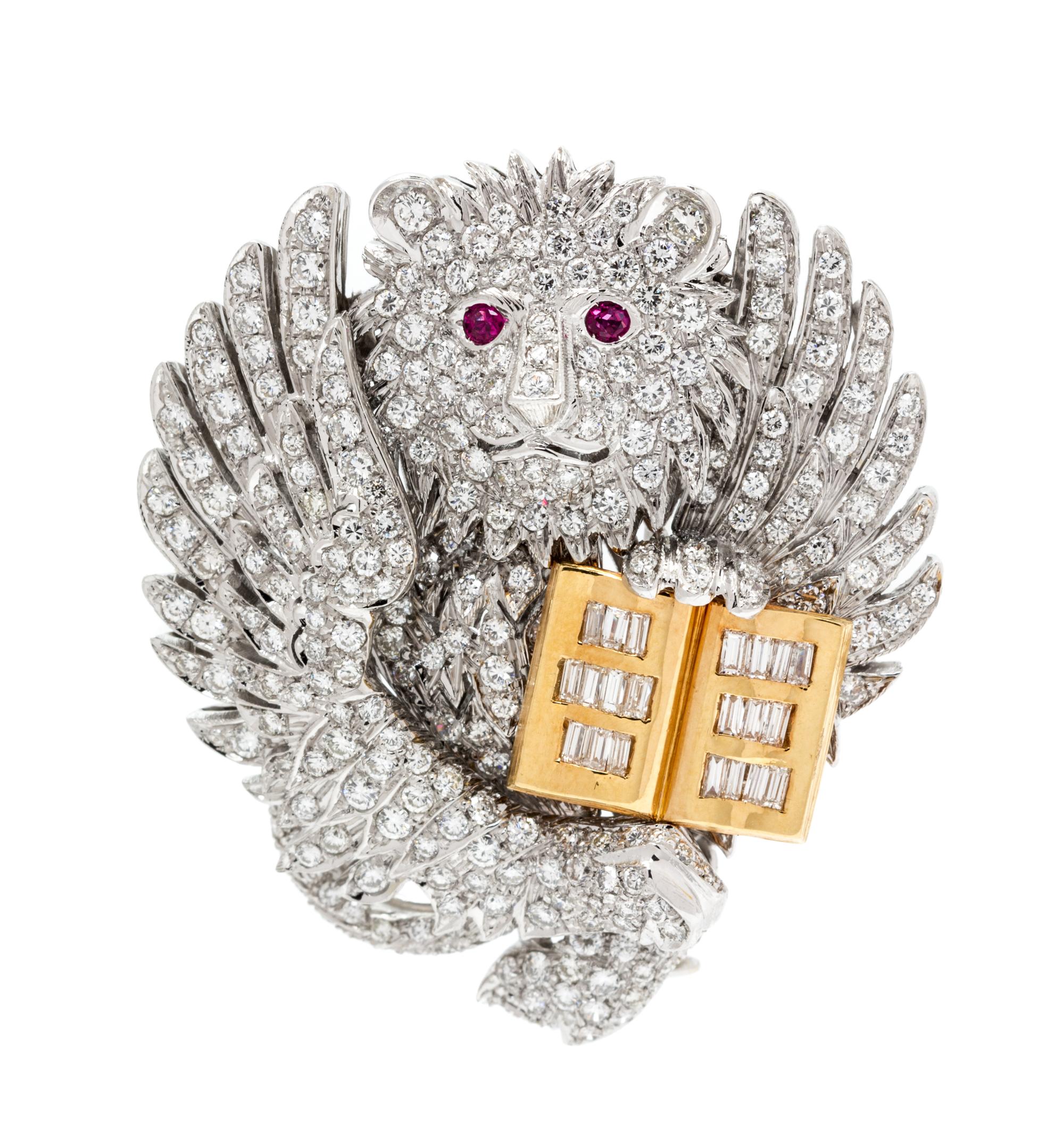 An 18 Karat Bicolor Gold, Diamond and Ruby St. Mark Winged Lion Brooch, Missiaglia, 18.25 dwts.