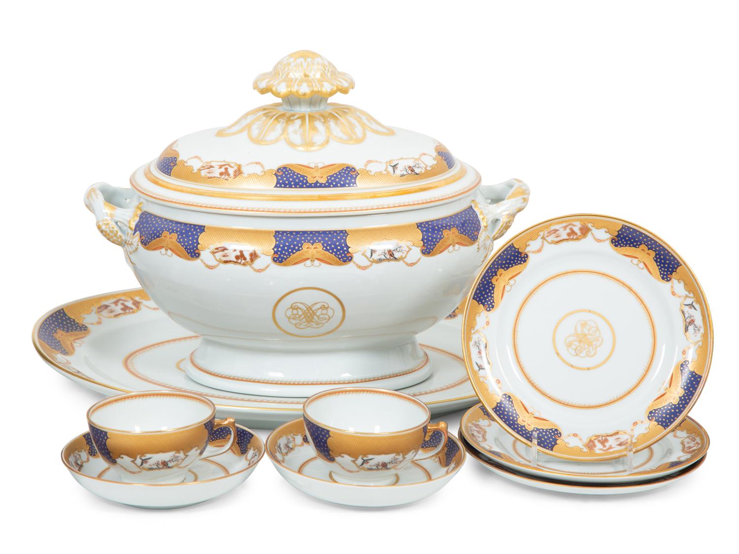 A Mottahedeh Porcelain Golden Butterfly Dinner Service