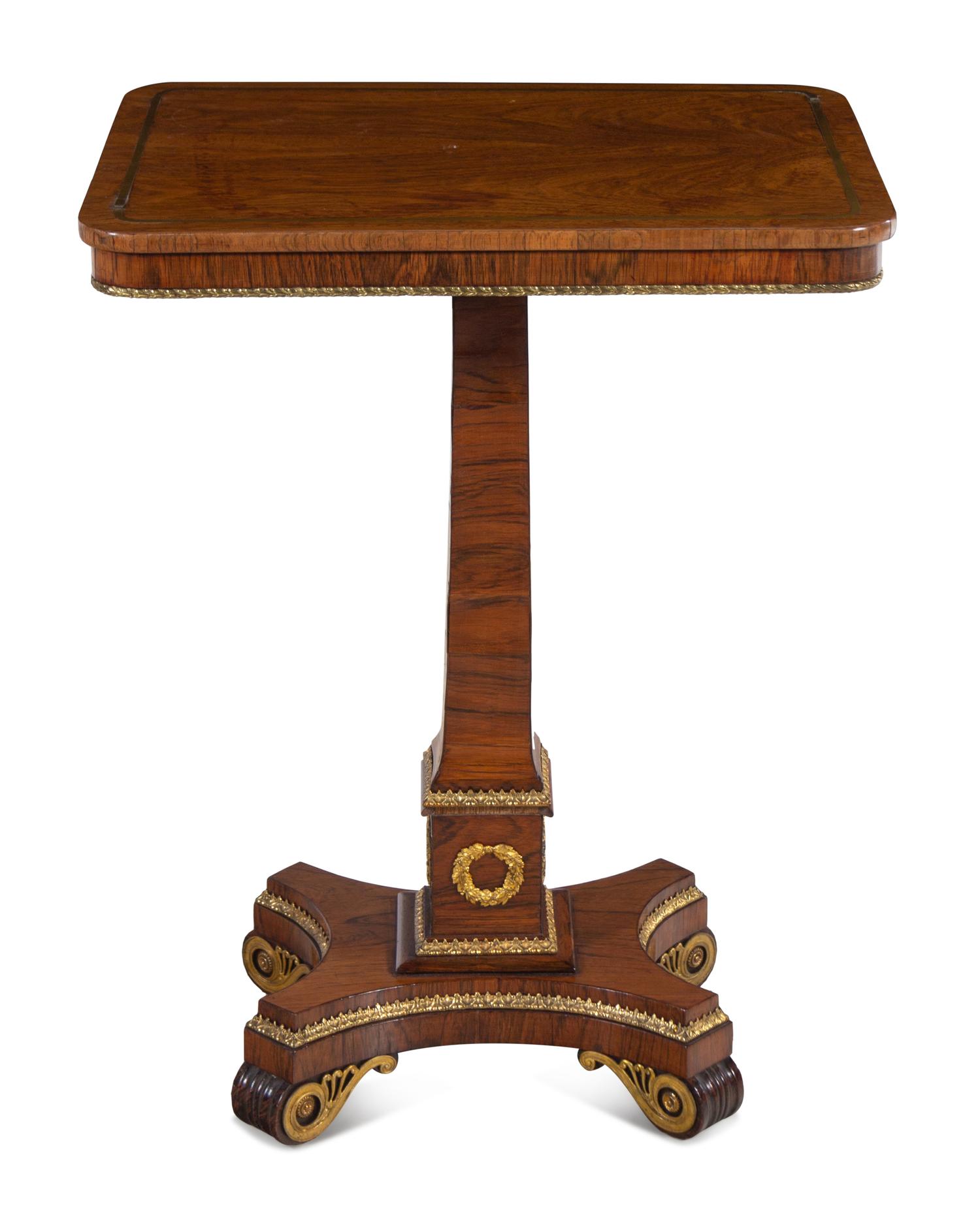 A Regency Gilt Bronze Mounted and Brass Inlaid Rosewood Occasional Table