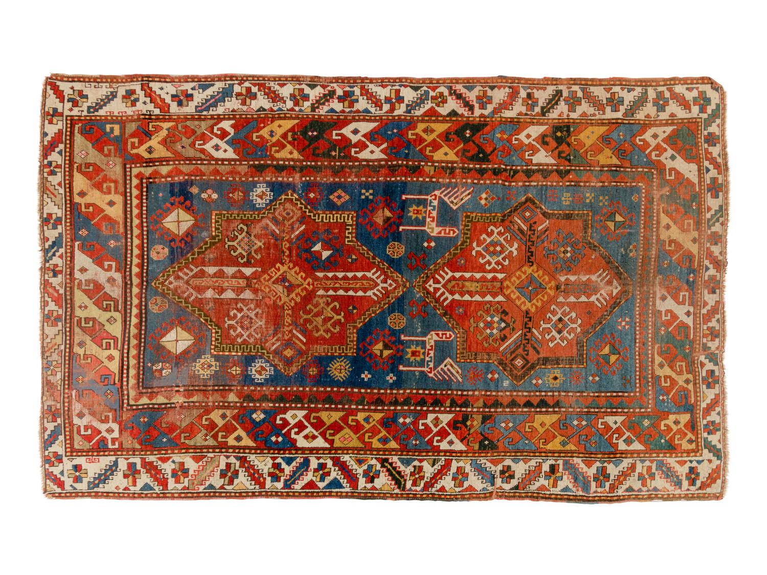 A Kuba Wool Rug and a Kuba Wool Mat