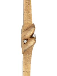 SOLD: 14K YELLOW GOLD AND DIAMOND SURPRISE WRISTWATCH