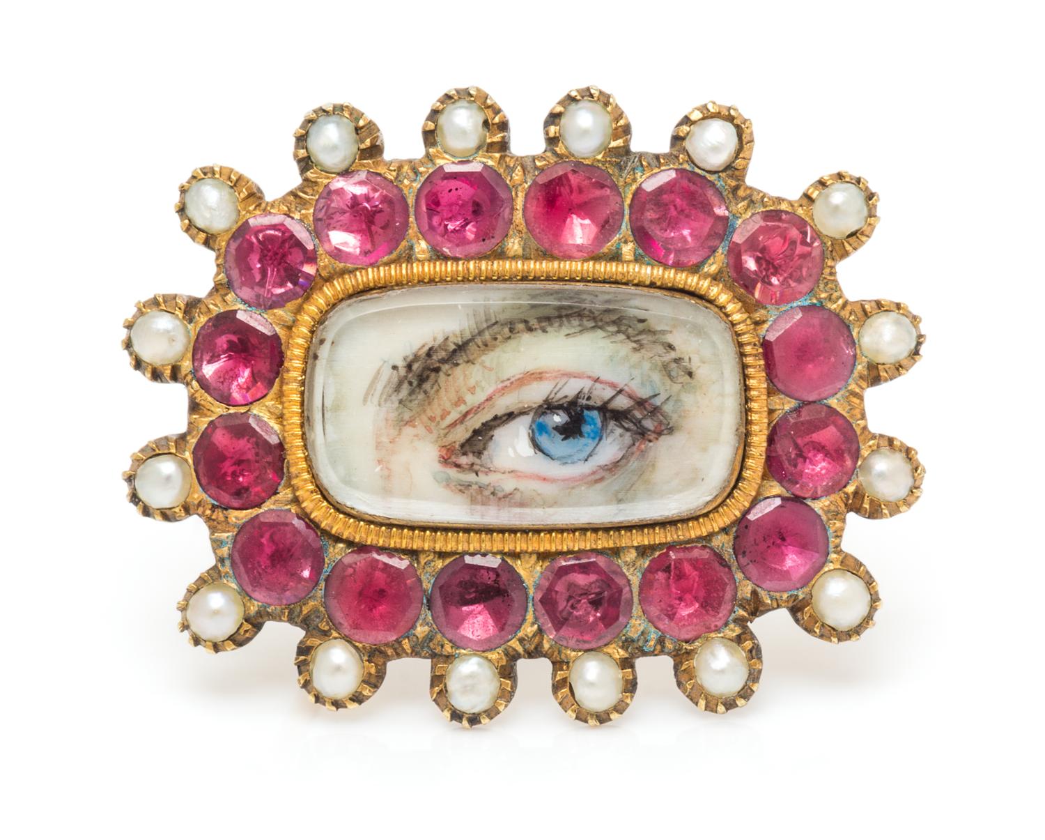A Georgian Yellow Gold, Pink Gemstone and Seed Pearl Lover's Eye Brooch, 4.10 dwts.