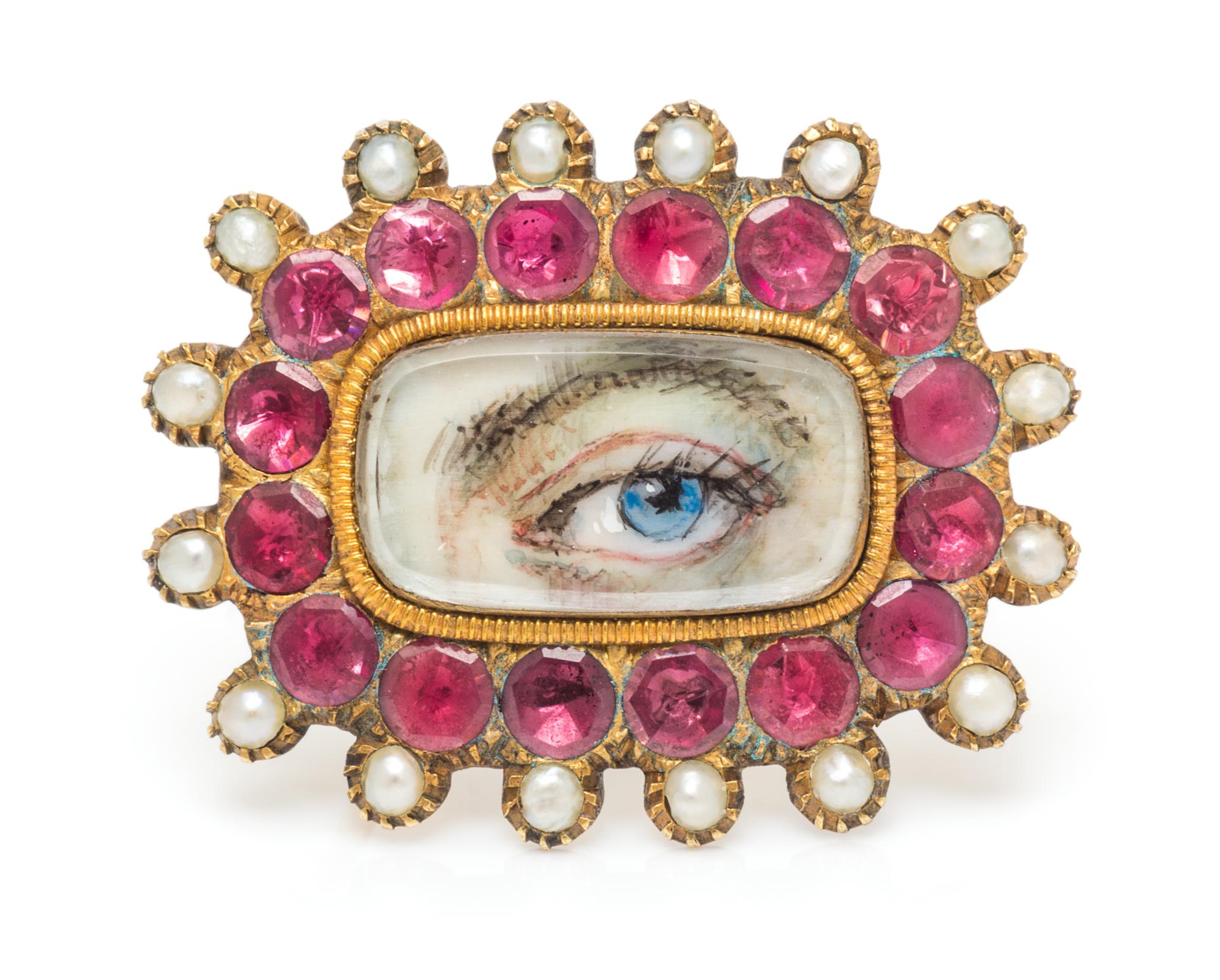 A Georgian Yellow Gold, Pink Gemstone and Seed Pearl Lover's Eye Brooch, 4.10 dwts.