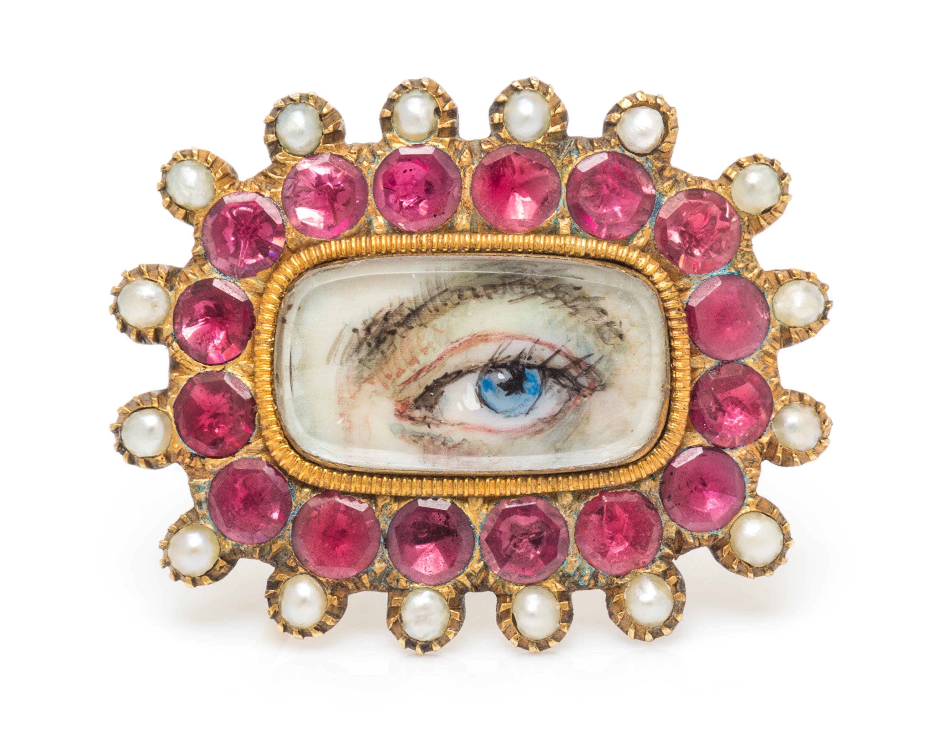 A Georgian Yellow Gold, Pink Gemstone and Seed Pearl Lover's Eye Brooch, 4.10 dwts.