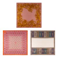 A Group of Vintage Scarves by Chanel, YSL, and Cartier