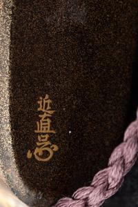 A Japanese Gold and Black Lacquer Three-Case Inro