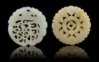 Two Pierce Carved Jade Pendants Diameter 2 1/4 inches.