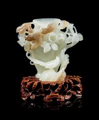 A Chinese White and Russet Jade Vase