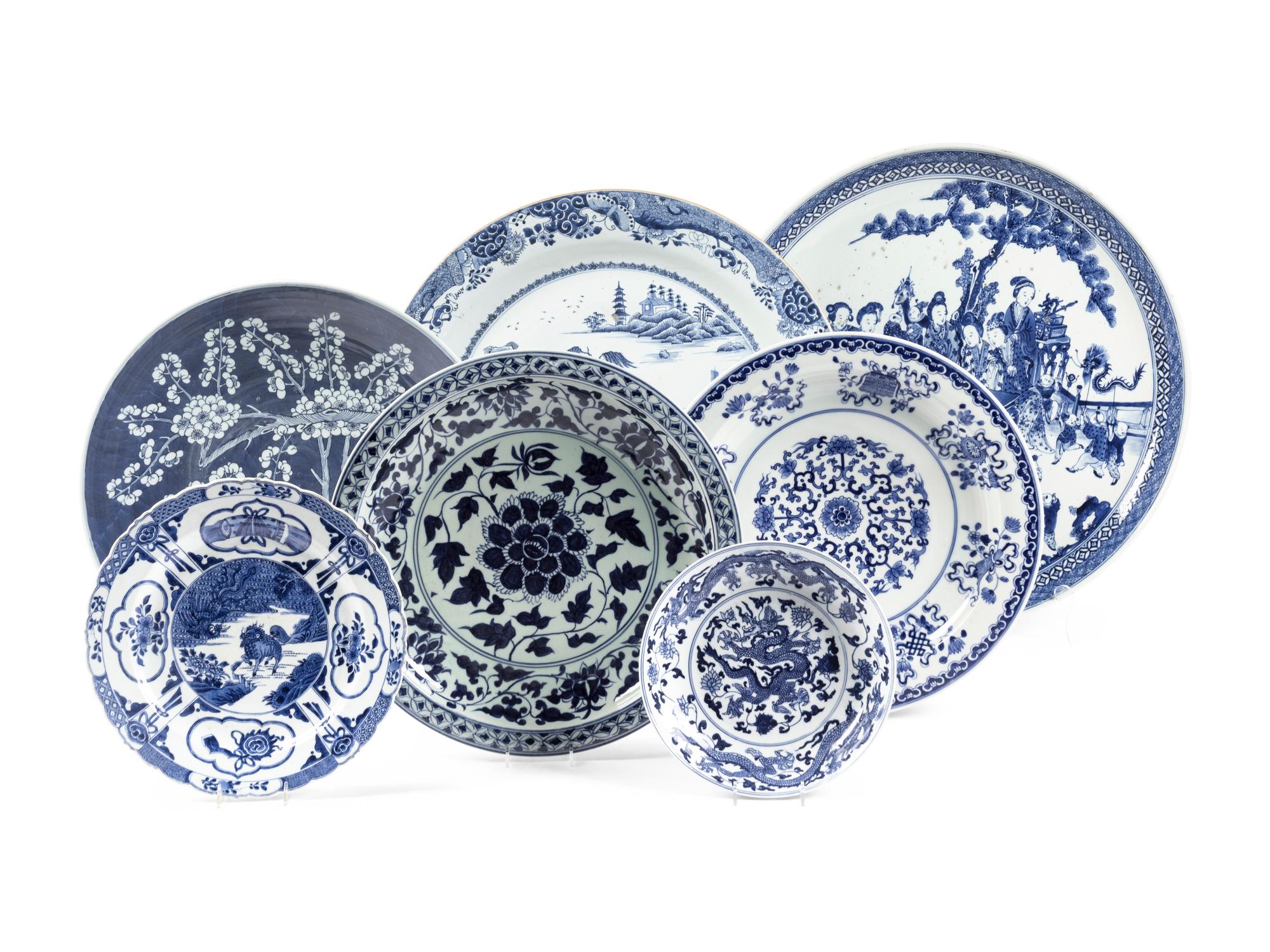 Seven Chinese Export Blue and White Porcelain Plates and Chargers