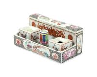 A Chinese Export Porcelain Famille Rose Inkstand And Pair Of Candlesticks