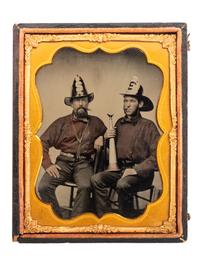 [EARLY PHOTOGRAPHY]. Quarter plate ambrotype of two likely New York firefighters enjoying a smoke.