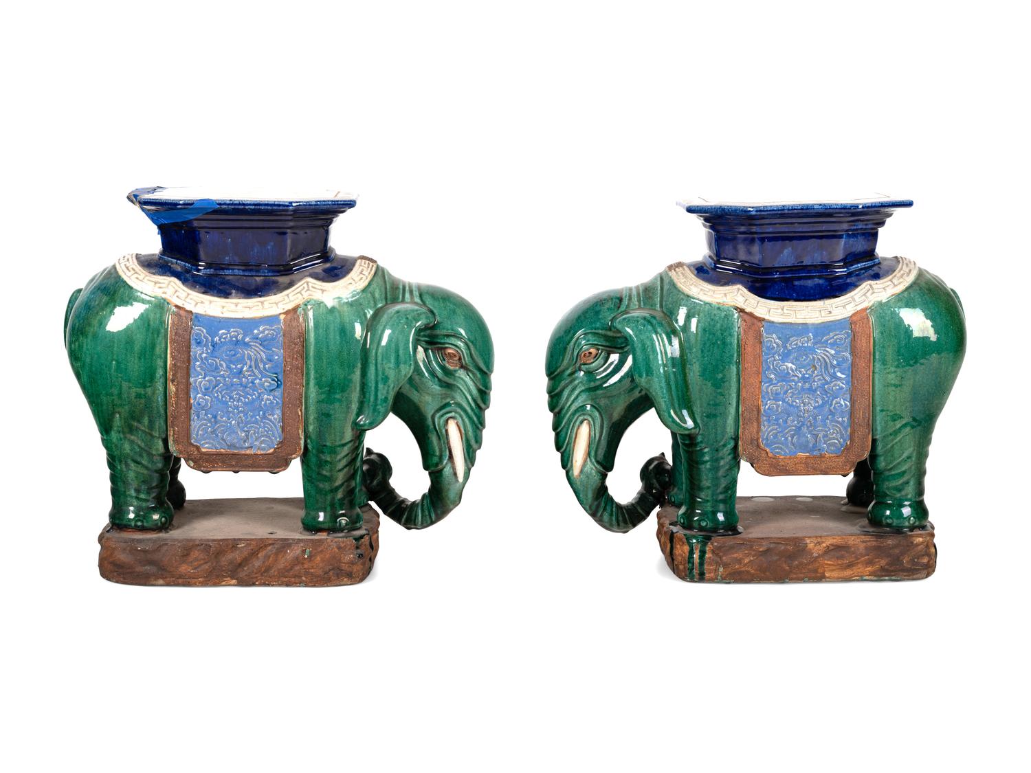 A Pair of Chinese Polychrome Glazed Porcelain Elephant Stands