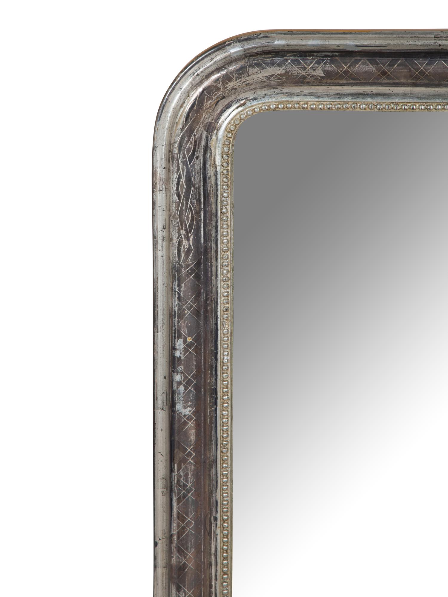A Silvered-Wood Domed Mirror — EARLY 20TH CENTURY